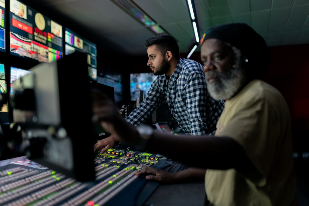 Broadcast engineers work in studio